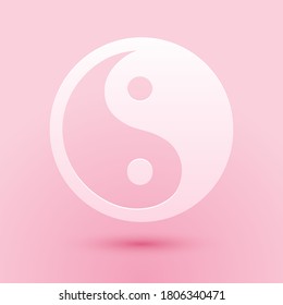 Paper cut Yin Yang symbol of harmony and balance icon isolated on pink background. Paper art style. Vector.