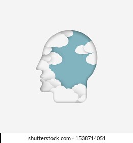 Paper cutout head profile with cloud and blue sky. Positive thinikg and stress management in psychology. 