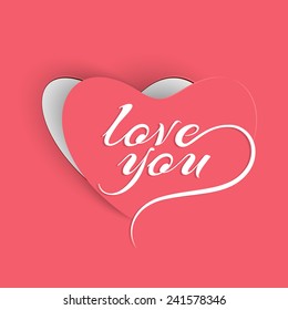 Paper cutout heart shape with Love You text for Happy Valentine's Day celebration.