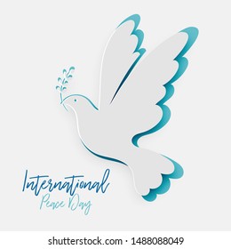 Paper Cutout Pigeon with leaf symbol of Peace. International Peace Day