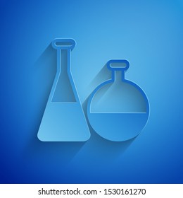 Paper cutTest tube and flask chemical laboratory test icon isolated on blue background. Laboratory glassware sign. Paper art style. Vector Illustration