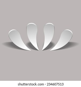 paper drops on a gray background