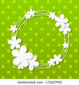 Paper flowers frame on green background