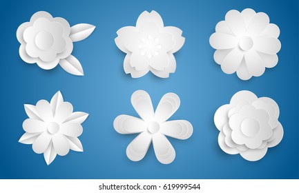 Paper flowers on blue background