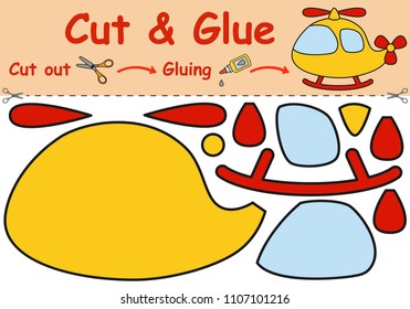 Paper game for the development of preschool children. Cut parts of the image and glue on the paper. Toy helicopter. Vector illustration 