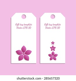 Paper gift tag template with flower ornament on pink background. Vector EPS 10