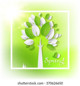 paper green tree on the spring abstract background