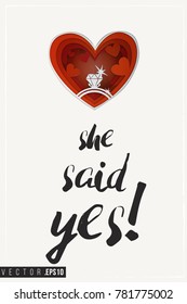 Paper greeting card with red heart with engagement ring and text: she said yes. Paper cut heart for bridal, wedding, engagement, valentines day. Vector art in 3d papercut style.