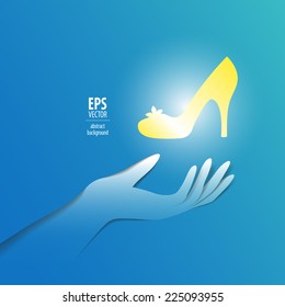 Paper hand with shiny slipper