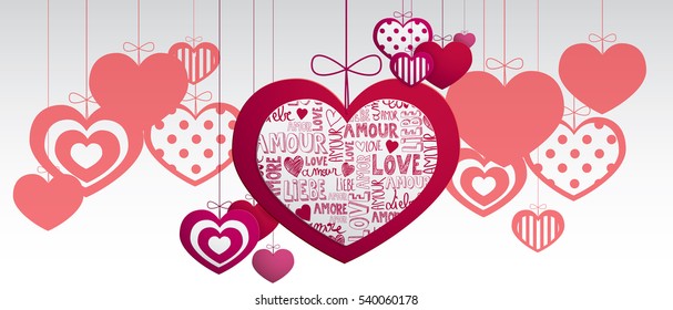 Paper hanging hearts isolated on a white background