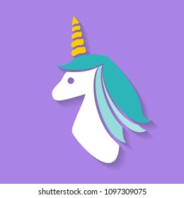 a paper head of the unicorn with a shadow on the violet background