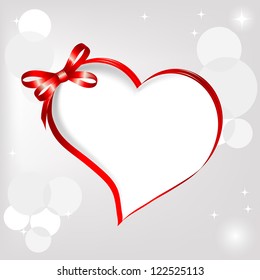 Paper heart with border from red ribbon