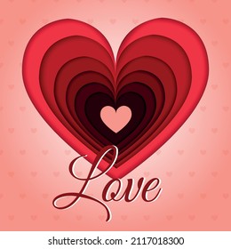 Paper heart carved or cut out with the word "love"