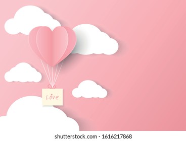 Paper heart with cloud on pink background. Pink Valentine's Day background.