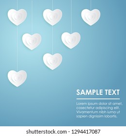 Paper heart on blue background