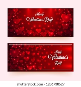 Paper heart shapes decorated with lighting effect on glossy red background with calligraphy of Happy Valentine's Day. Header or banner set design.