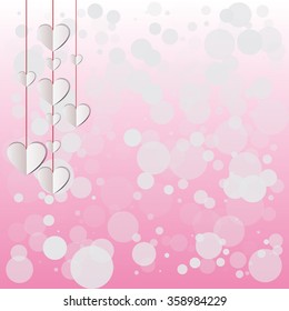Paper hearts hanging on a pink shimmering background. vector love background