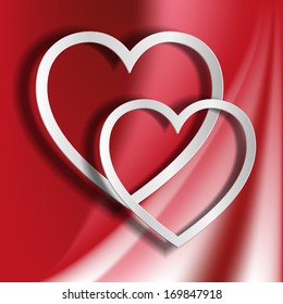 paper hearts on a red background