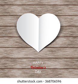 Paper hearts on wooden background. Valentines day. Abstract card