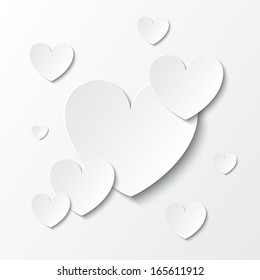 Paper hearts Valentines day card on white background. Vector abstract background with hearts. Paper hearts cut from paper.