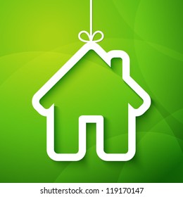 Paper house on green background. Vector illustration.