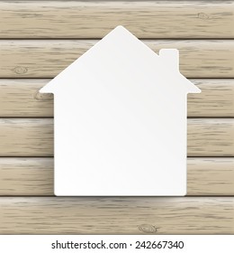 Paper house symbol on the wooden background. Eps 10 vector file.