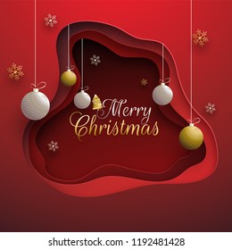 Paper layer cut background decorated with hanging baubles and snowflakes for Merry Christmas celebration.