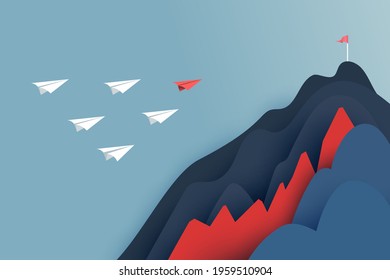 Paper leader airplane flying over obstacle to the red flag target on mountains .Successful and business teamwork concept.Paper art vector illustration.