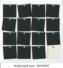 Paper lined note many blacks and  white.