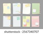 paper lists with a lot of stickers