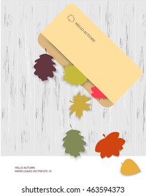 Paper maple, oak, birch leaves falling out of envelope, green, orange, brown. Vector illustration. Hello autumn. Wood boards texture