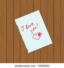 Paper note on a wooden background