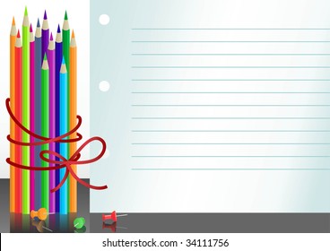bloc de notas de papel con lápices de colores