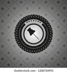 paper pin icon inside black badge