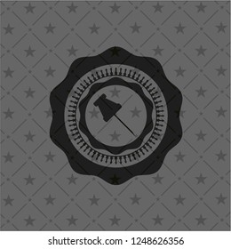 paper pin icon inside black badge