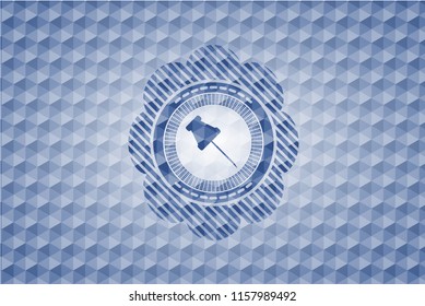 paper pin icon inside blue badge with geometric pattern.