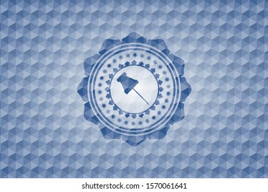 paper pin icon inside blue badge with geometric pattern.