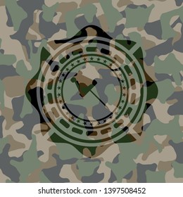 paper pin icon inside camouflaged emblem