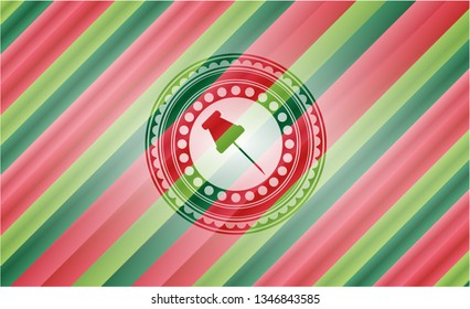 paper pin icon inside christmas colors style badge.