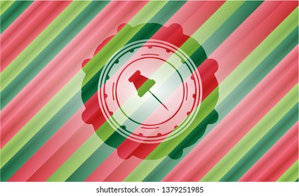 paper pin icon inside christmas badge.