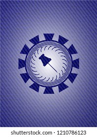 paper pin icon inside emblem with jean background