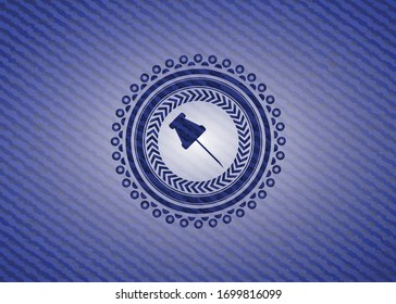 paper pin icon inside emblem with jean texture