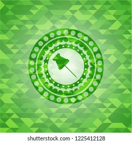 paper pin icon inside green emblem with mosaic ecological style background