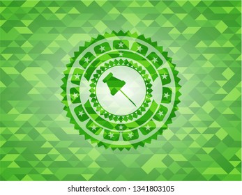 paper pin icon inside green emblem with mosaic ecological style background