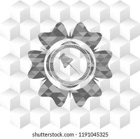 paper pin icon inside grey badge with geometric cube white background