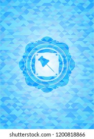 paper pin icon inside light blue mosaic emblem