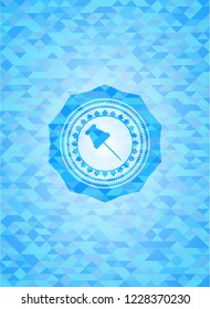 paper pin icon inside light blue emblem with triangle mosaic background