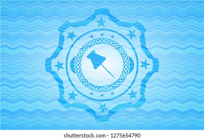 paper pin icon inside light blue water wave emblem background.