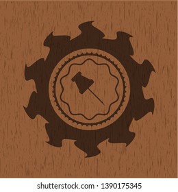 paper pin icon inside realistic wood emblem