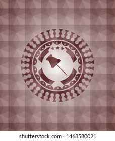 paper pin icon inside red seamless geometric emblem.